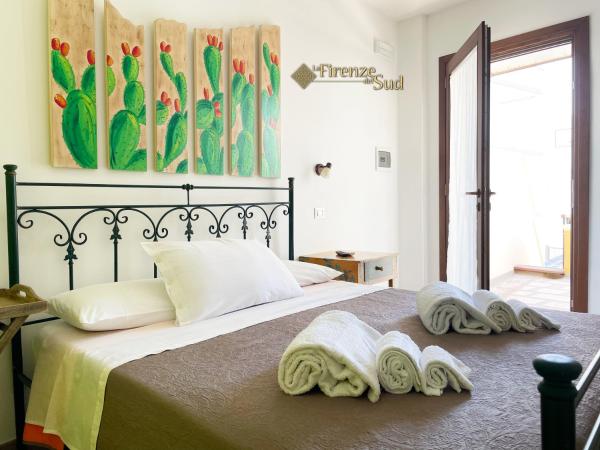 La Firenze del Sud : photo 7 de la chambre chambre lit king-size - vue sur jardin