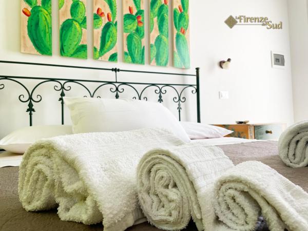 La Firenze del Sud : photo 3 de la chambre chambre lit king-size - vue sur jardin