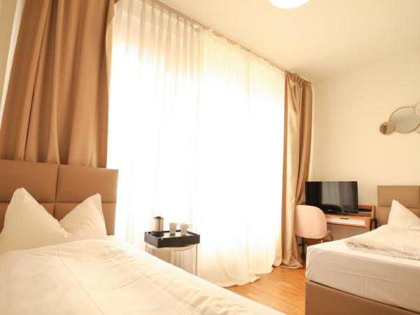 TM Hotel Düsseldorf : photo 7 de la chambre chambre lits jumeaux Économique