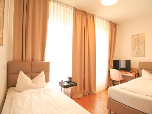 TM Hotel Düsseldorf : photo 8 de la chambre chambre lits jumeaux Économique