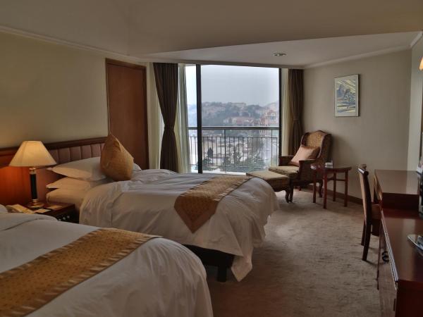 Huiquan Dynasty Hotel Qingdao : photo 3 de la chambre south wing twin room with sea view