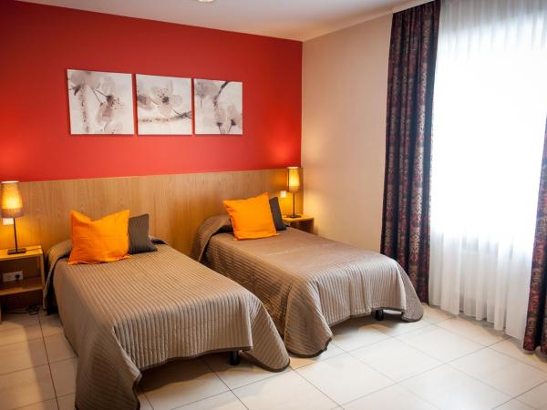 Hotel Pax : photo 4 de la chambre chambre double lits jumeaux