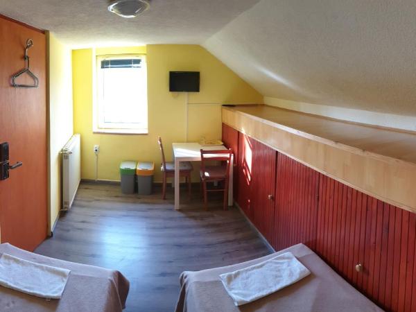 Jáde Panzió : photo 4 de la chambre chambre lits jumeaux