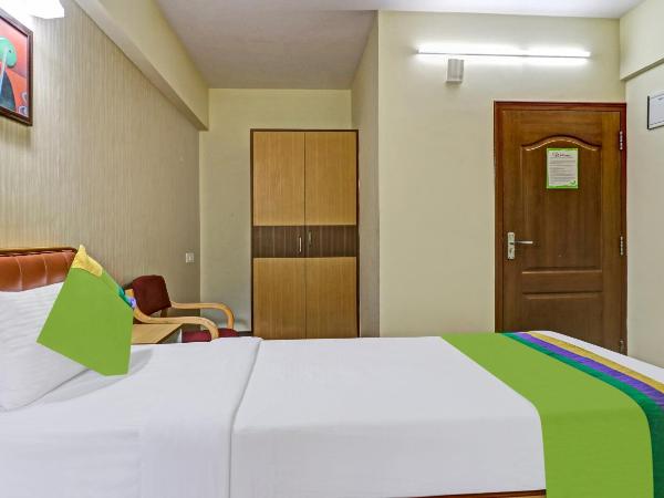 Treebo Akshaya Mayflower Vijaya Bank Layout : photo 5 de la chambre [sanitized] single room