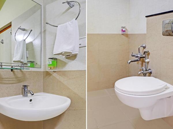 Treebo Akshaya Mayflower Vijaya Bank Layout : photo 10 de la chambre [sanitized] single room