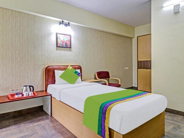 Treebo Akshaya Mayflower Vijaya Bank Layout : photo 4 de la chambre [sanitized] single room
