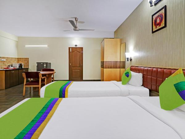 Treebo Akshaya Mayflower Vijaya Bank Layout : photo 4 de la chambre [sanitized] deluxe double room