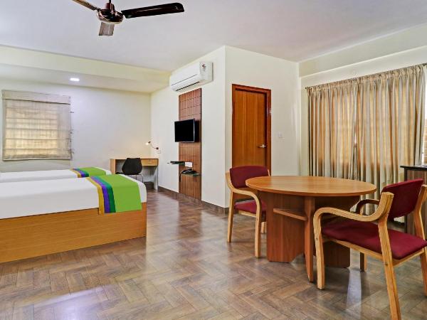 Treebo Akshaya Mayflower Vijaya Bank Layout : photo 7 de la chambre [sanitized] deluxe double room