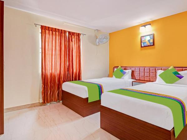 Treebo Akshaya Mayflower Vijaya Bank Layout : photo 1 de la chambre [sanitized] premium double room