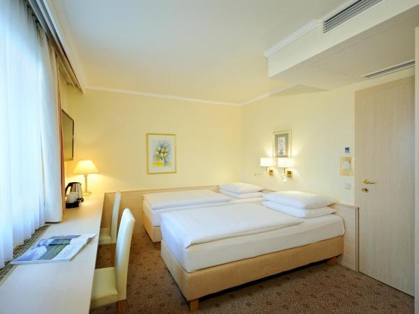 Hotel Scherer : photo 6 de la chambre chambre lits jumeaux