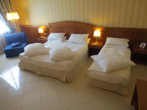 Hotel Joyfull : photo 1 de la chambre chambre triple