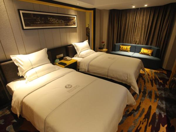 Insail Hotels ( Huanshi Road Taojin Metro Station Guangzhou) : photo 3 de la chambre chambre lits jumeaux affaires deluxe