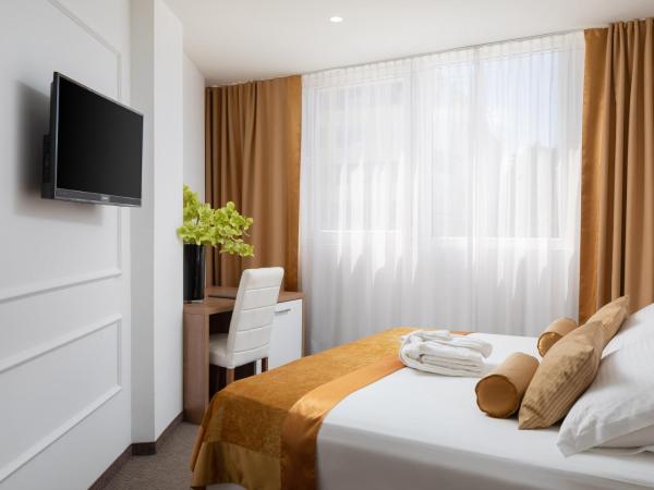 Hotel Corner : photo 1 de la chambre chambre double ou lits jumeaux standard - vue sur ville