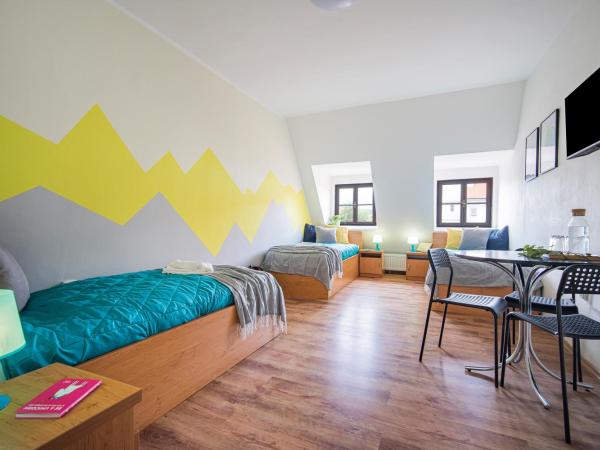 Penzion Village Peace #29 by Goodnite cz - U Libušky : photo 2 de la chambre chambre triple