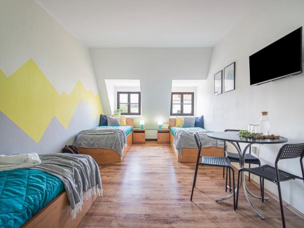 Penzion Village Peace #29 by Goodnite cz - U Libušky : photo 3 de la chambre chambre triple