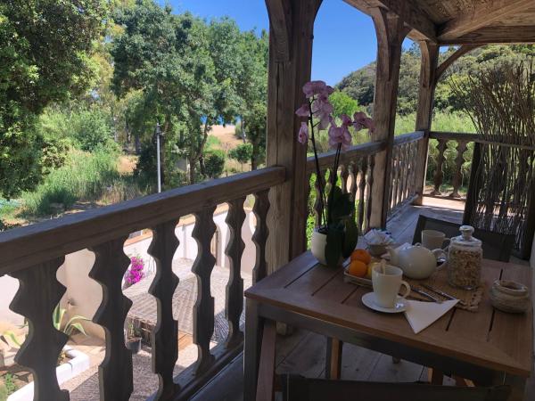 Le Clos des Sept Palmiers : photo 1 de la chambre chambre double avec balcon (3 adultes)