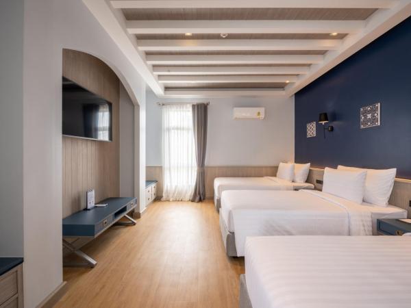 Seabed Grand Hotel Phuket - SHA Extra Plus : photo 1 de la chambre chambre triple deluxe