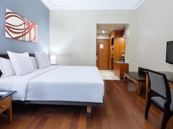Kimaya Sudirman Yogyakarta by Harris : photo 4 de la chambre chambre double ou lits jumeaux exécutive