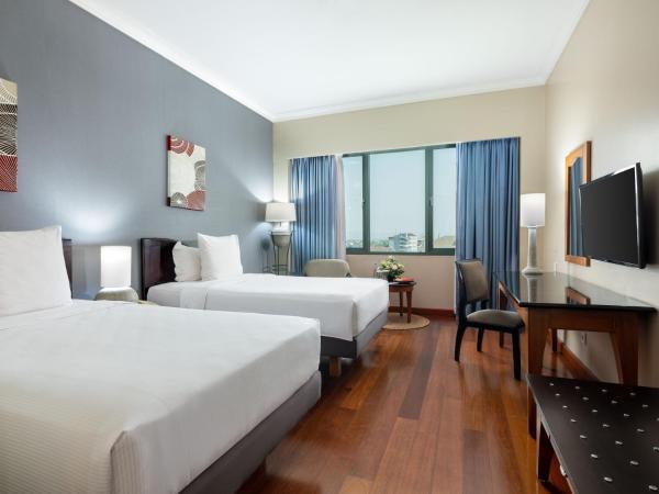 Kimaya Sudirman Yogyakarta by Harris : photo 1 de la chambre chambre deluxe double ou lits jumeaux