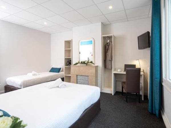 Logis Hotel Du Chateau : photo 3 de la chambre chambre lits jumeaux avec salle de bains