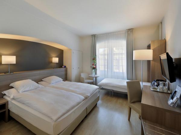 Hôtel de la Rose : photo 1 de la chambre chambre triple