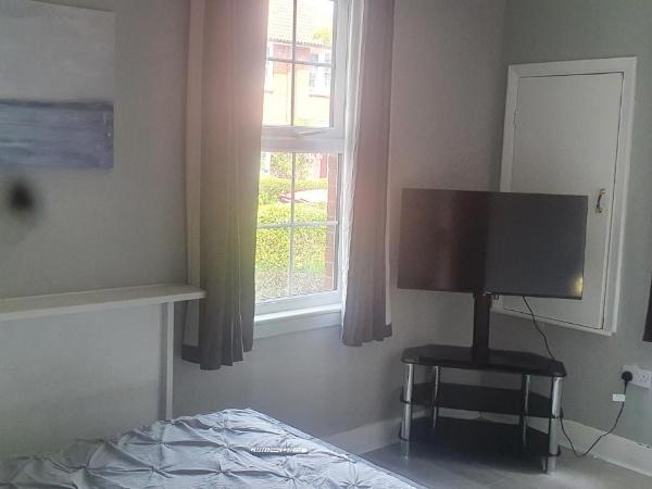 Tower Gardens Residence : photo 1 de la chambre chambre double avec salle de bains privative