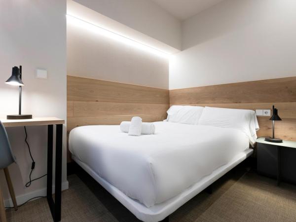 URBAIA ROOMS : photo 1 de la chambre petite chambre double