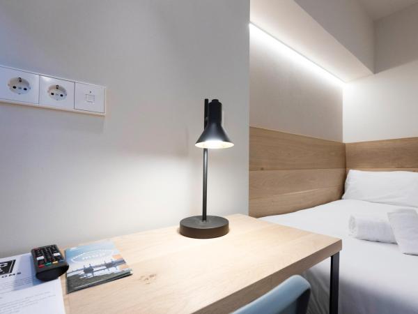 URBAIA ROOMS : photo 3 de la chambre petite chambre double