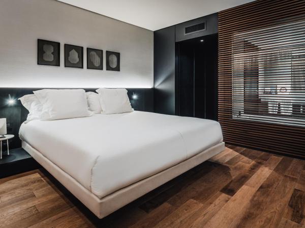 SLS Buenos Aires Puerto Madero : photo 1 de la chambre suite lit king-size de luxe avec vue