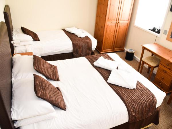 Stuart hotel : photo 3 de la chambre chambre triple confort avec douche