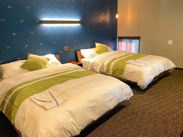 和みの宿 おりがみ : photo 2 de la chambre chambre double ou lits jumeaux avec salle de bains privative