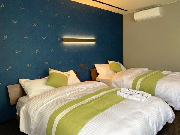 和みの宿 おりがみ : photo 5 de la chambre chambre double ou lits jumeaux avec salle de bains privative