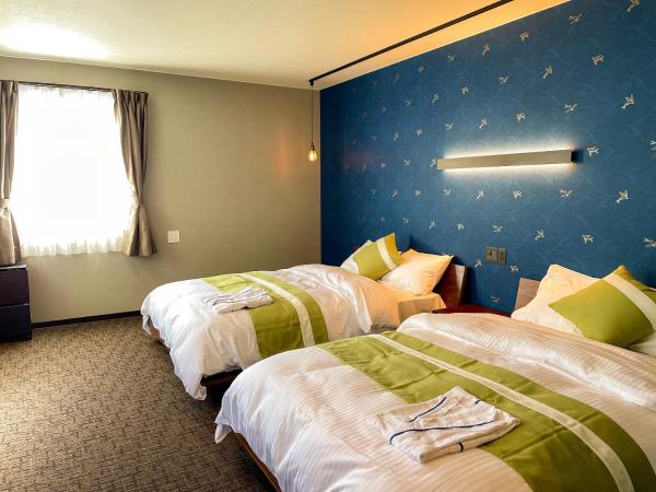 和みの宿 おりがみ : photo 7 de la chambre chambre double ou lits jumeaux avec salle de bains privative