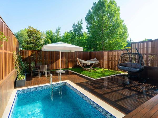 Radisson Blu Hotel & Spa, Istanbul Tuzla : photo 1 de la chambre suite piscine avec sauna et jardin