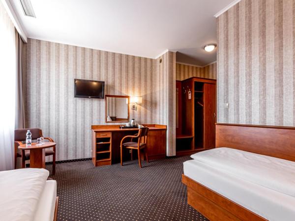 Premium Hotel Bacero Wrocław : photo 7 de la chambre chambre lits jumeaux