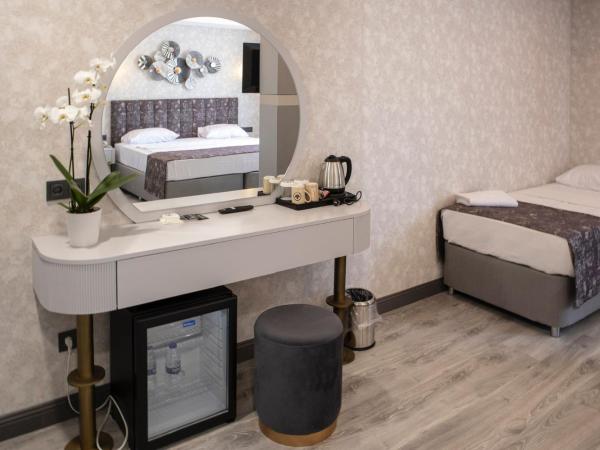 Avion Suite Hotel : photo 6 de la chambre chambre triple deluxe