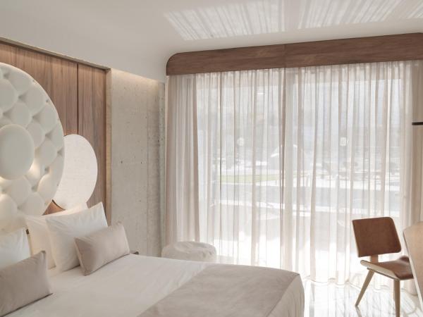 Nautilux Rethymno by Mage Hotels : photo 3 de la chambre suite junior avec piscine privée - vue sur piscine