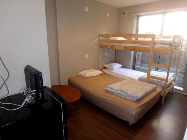 Economy Hotel Hoteiya : photo 3 de la chambre chambre triple Économique avec salle de bains commune