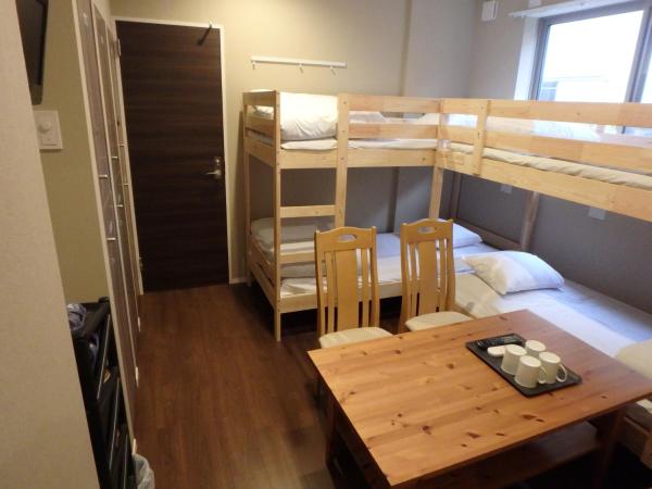 Economy Hotel Hoteiya : photo 1 de la chambre chambre quadruple Économique avec salle de bains commune