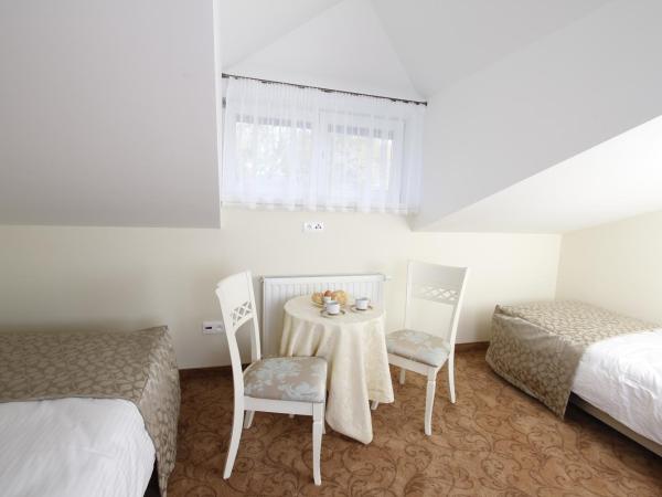 Lawendowy Dworek : photo 7 de la chambre chambre lits jumeaux