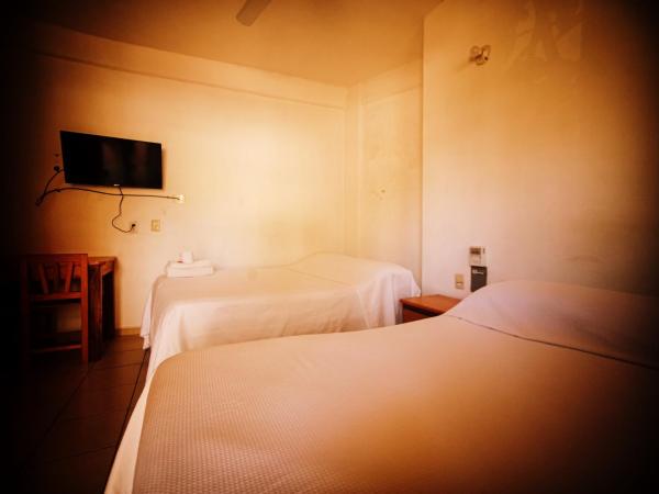 Hotel Yurimar : photo 1 de la chambre chambre quadruple