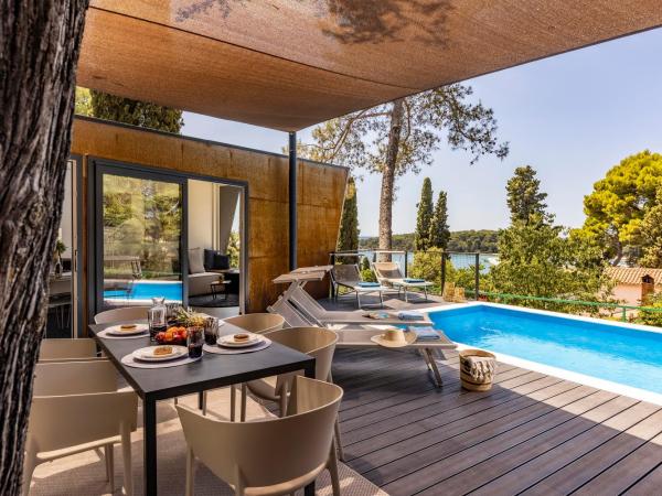 Porton Nature Hideouts : photo 1 de la chambre maison de vacances familiale 2 modules avec piscine