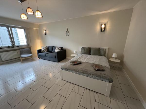 rooms train station : photo 7 de la chambre chambre quadruple avec salle de bains commune