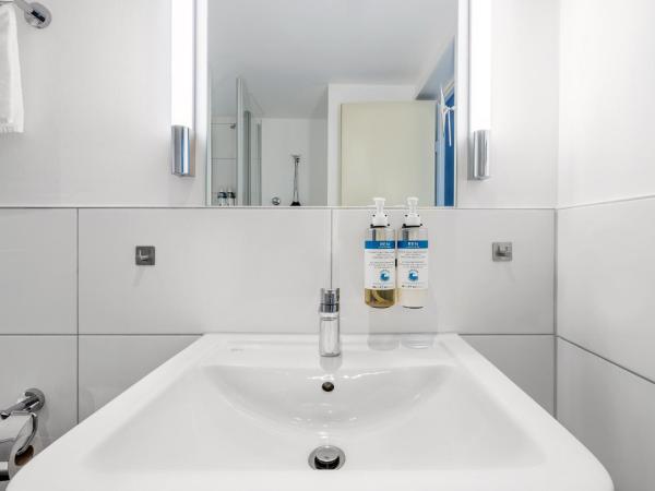 numa I Artol Rooms & Apartments : photo 8 de la chambre medium studio with kitchenette and balcony