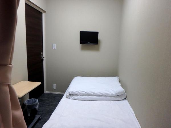 Economy Hotel Hoteiya : photo 5 de la chambre chambre simple avec toilettes et douche communes