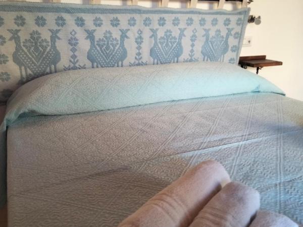 Agriturismo i doni del mandorlo : photo 3 de la chambre chambre double deluxe avec lit d'appoint