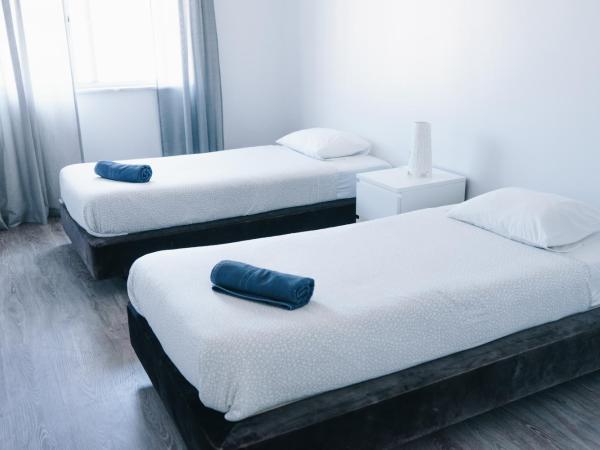 Ocean Guesthouse Peniche : photo 6 de la chambre chambre lits jumeaux