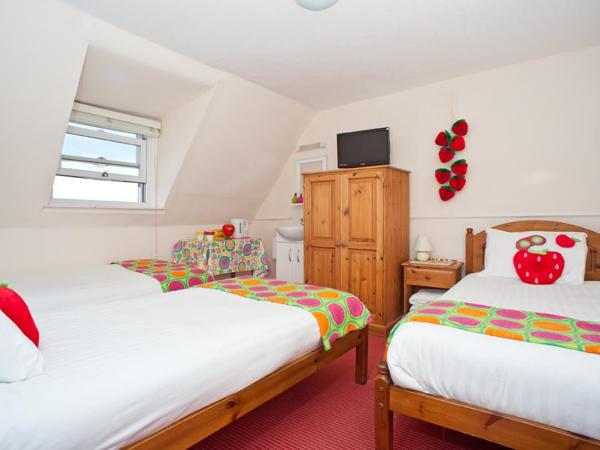 Strawberry Fields : photo 2 de la chambre chambre triple avec salle de bains commune