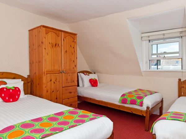 Strawberry Fields : photo 1 de la chambre chambre triple avec salle de bains commune