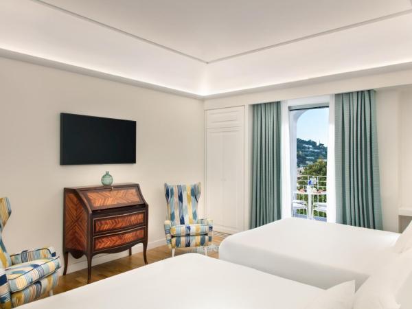 Pazziella Garden & Suites : photo 1 de la chambre chambre quadruple prestige avec vue sur le jardin